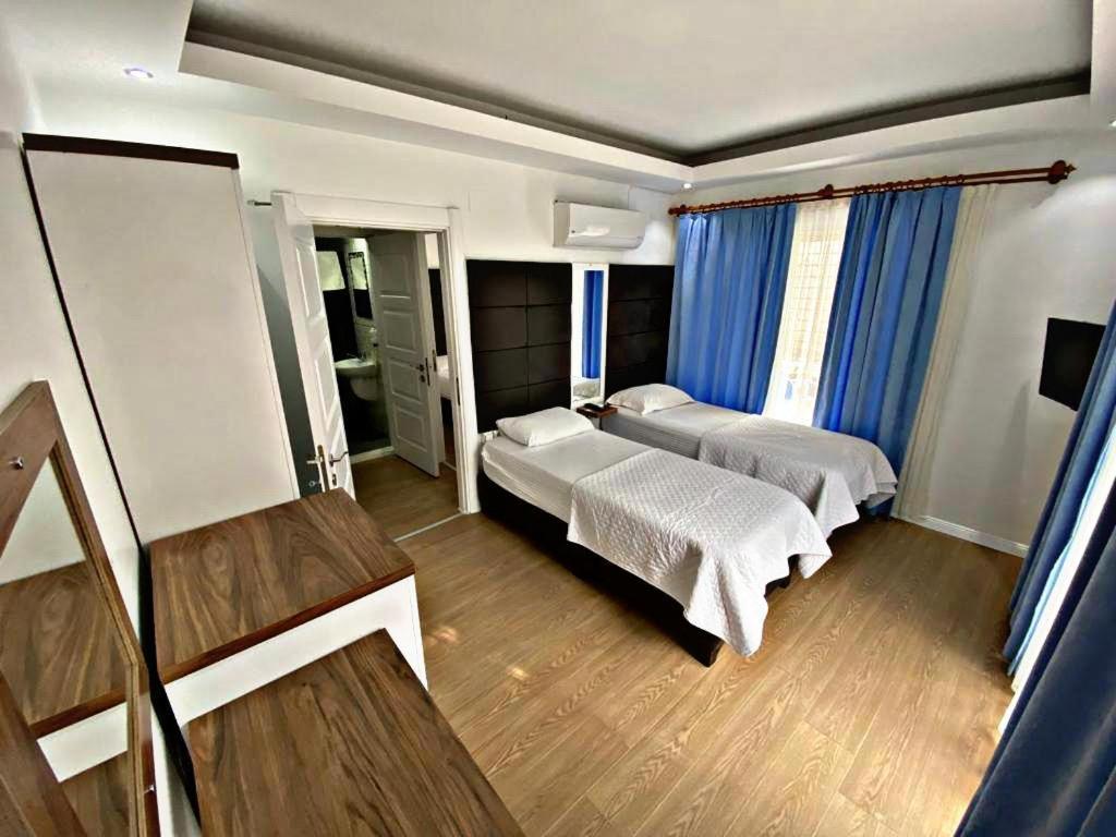 Lotus Otel Ташуджу Экстерьер фото